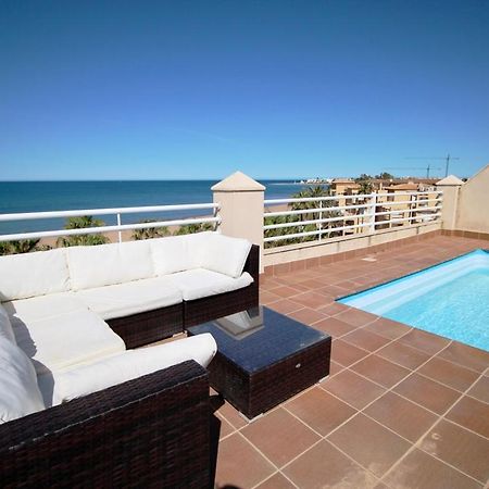 Appartamento Ático espectacular con piscina privada en primera línea de playa Dénia Esterno foto