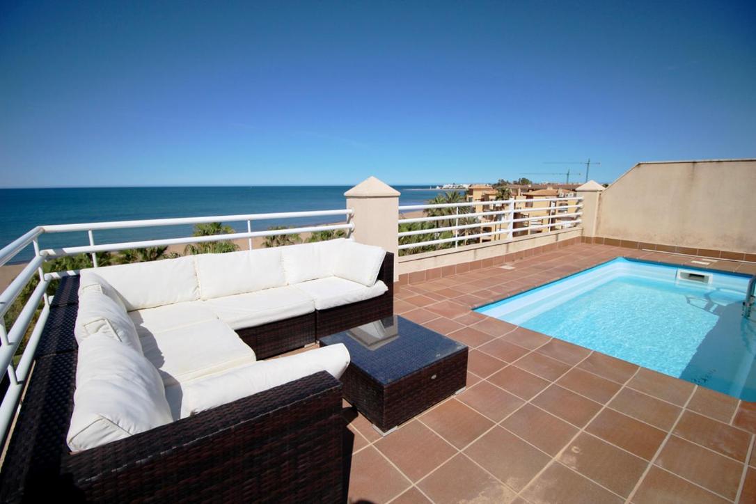 Appartamento Ático espectacular con piscina privada en primera línea de playa Dénia Esterno foto