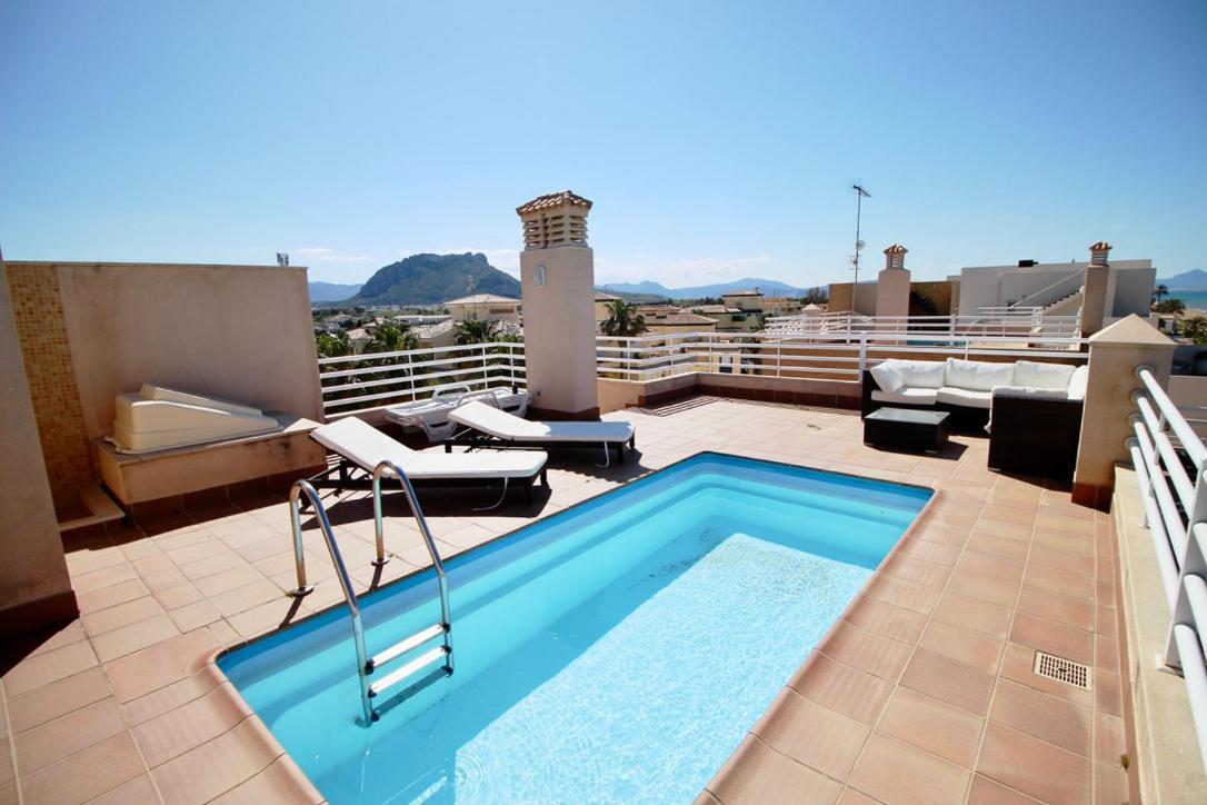 Appartamento Ático espectacular con piscina privada en primera línea de playa Dénia Esterno foto