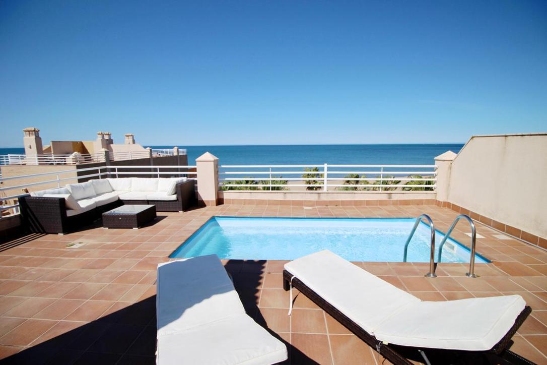 Appartamento Ático espectacular con piscina privada en primera línea de playa Dénia Esterno foto